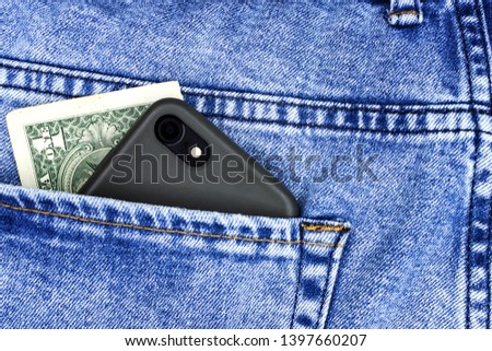 Smartphone and money in your pocket
