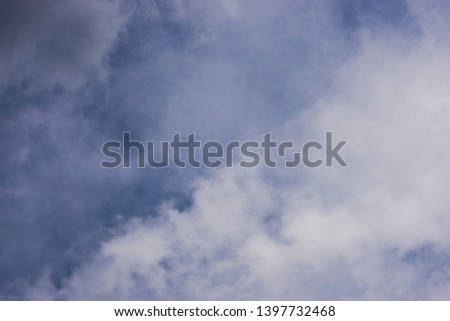 Blue sky with clouds. The clouds are white.