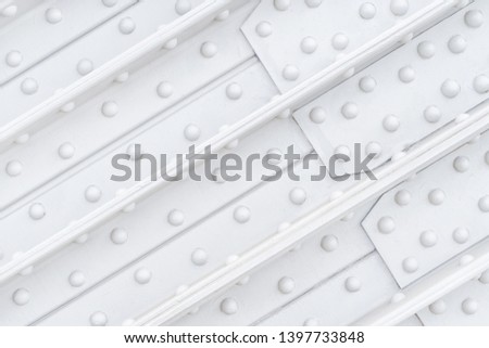 White heavy steel construction close up. Industrial texture and background