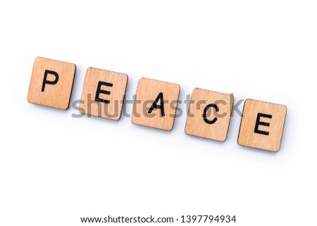 The word PEACE, spelt with wooden letter tiles over a plain white background. 