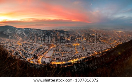 Kronstadt city or Brasov in Romania, winter view at sunset from Tampa peak