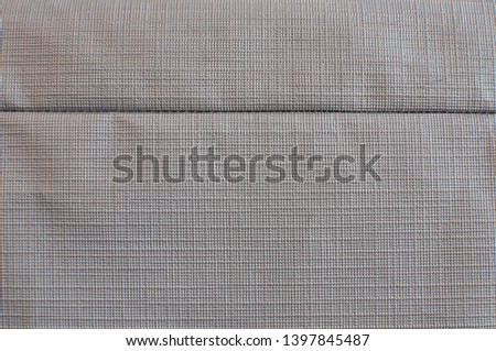 Sofa fabric for background, grey textile with square pattern. Cloth texture.