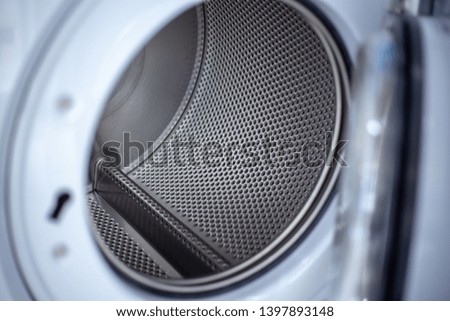 Close up photo of inside washing machine drum.