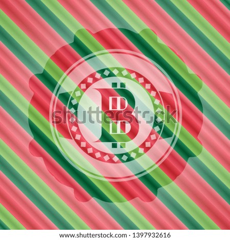 bitcoin icon inside christmas colors style badge.