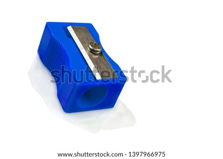 Large pencil sharpener on a white isolated background, close-up with space for the text.