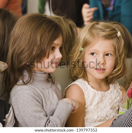  little girls at birthday party having fun