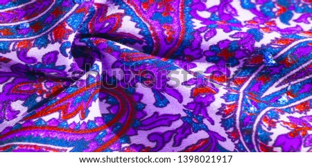 Background texture, pattern, paisley fabric cotton.  Designed by Kaffe Fassett for Free Spirit, the color palette of this large paisley is shades of green with hot pink, cobalt blue, fuchsia 