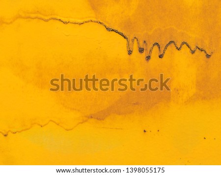 background image smudges of yellow paint and rust on metal