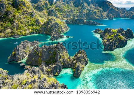 Aerial view of beautiful lagoons and limestone cliffs of Coron, Palawan, Philippines Royalty-Free Stock Photo #1398056942