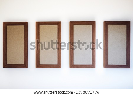 4 blank frame on wall background,free space for text,empty frame,frame for advertisement
