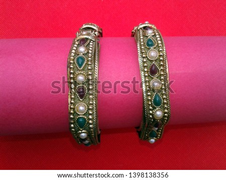 bangles with unique colour combinations on red back ground