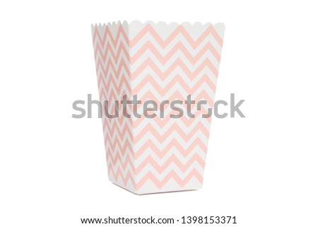 Empty box for Popcorn, Fries and Chicken Legs to pink with white chevron on isolated background. Selective focus.