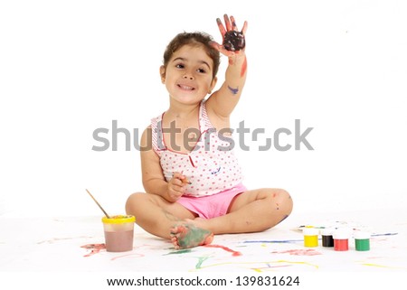 nice young girl painting picture on a white background