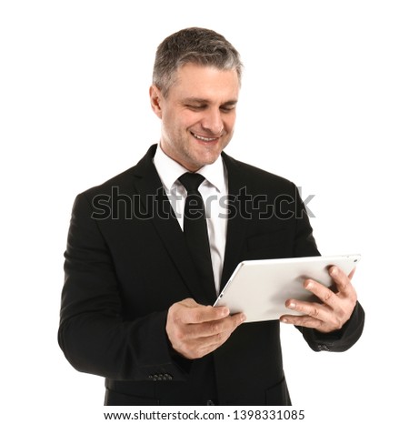 Portrait of handsome mature businessman with tablet computer on white background