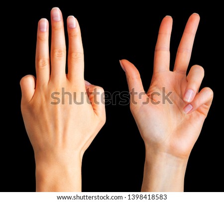 Set of woman hands showing three fingers and palm on black background. Isolated with clipping path.