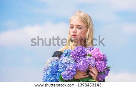 Allergy free life. Stop allergy blooming season. Enjoy spring without allergy. Springtime bloom. Pollen allergy. Gentle flower for delicate woman. Girl tender blonde hold hydrangea flowers bouquet.