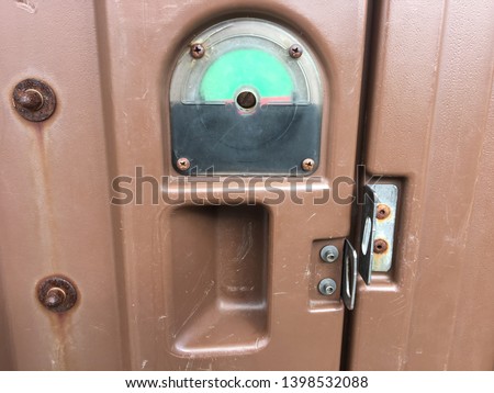 Porta potty bathroom green open door lock symbol sign red unlocked unlock public restroom toilet