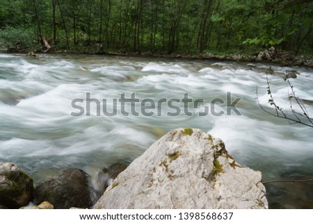 Rapid mountain river with ice cold water