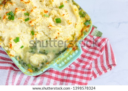 Classic Fish Pie with Mashed Potato in a Baking Tray, Directly Above Photo. Fisherman's pie, Traditional British 
Dish.