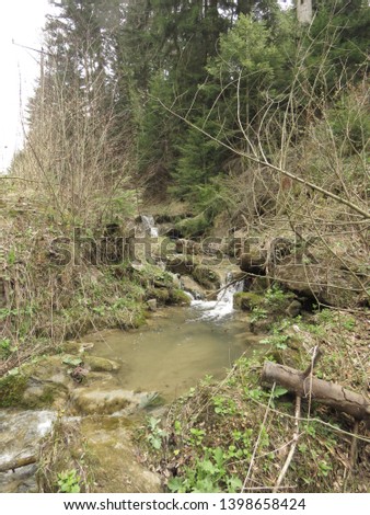 waterfall on mountain creek in forest, 