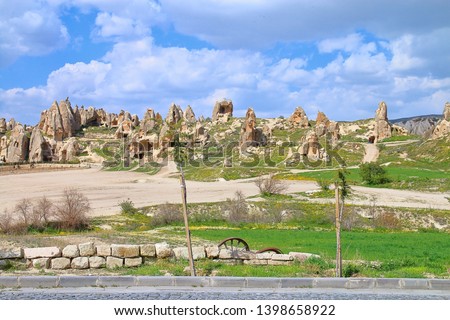 The photo was taken in Turkey in the spring. The picture shows an ancient cave settlement in the mountains of Cappadocia.