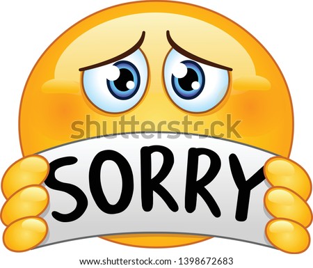 Sad and apologizing emoticon emoji holding a sign with the text sorry Royalty-Free Stock Photo #1398672683