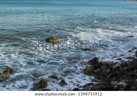 beautiful stony coast of mediterranean sea in greece in sunny day