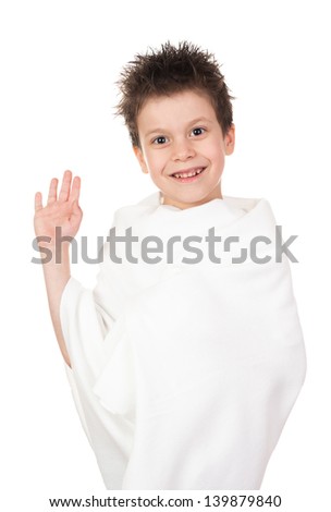 child in towel with wet hair isolated