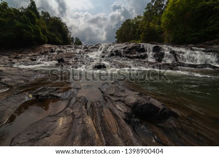 Panoramic beautiful deep forest waterfall in malaysia