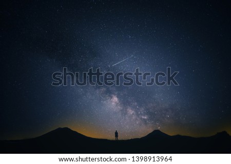 a man looking at the sky with a lot of stars, galaxy mily way
