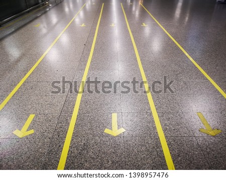 Yellow Go or Come Sign on the walk way at sub way station in Bangkok Thailand  