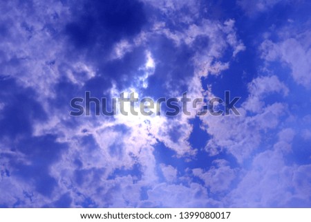 Stormy white clouds on blue sky. Cloudscape background with fluffy cloud on blue summer sky wallpaper texture horisontal position
