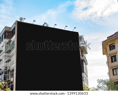 billboard on building. blank mockup and template empty frame for logo or text on exterior street advertising poster screen city background, modern flat style, outdoor banner advertisement
