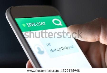 Customer service and support live chat with chatbot and automatic messages or human servant. Assistance and help with mobile phone app. Automated bot and robot. Smartphone helpdesk for feedback cell. Royalty-Free Stock Photo #1399145948