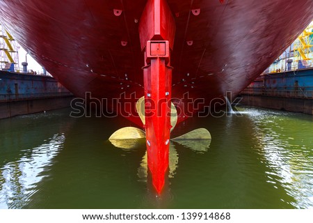 Close up of a Ship Propeller in water. Royalty-Free Stock Photo #139914868