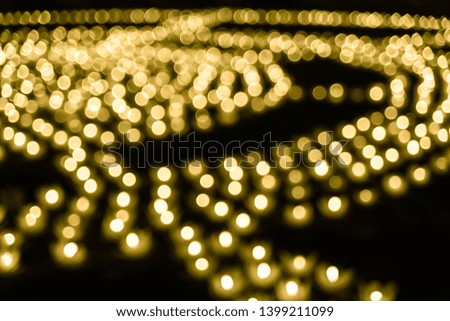 Abstract bokeh background. Soft defocused lights. Neon basic yellow color