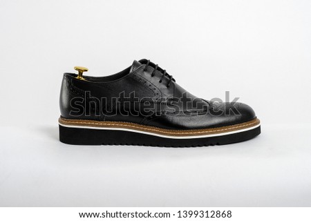 Classic male leather shoes. Isolated on white background. Side view