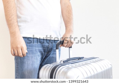 Man with a large suitcase