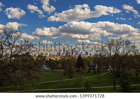 Minneapolis skyline with puffy white clouds