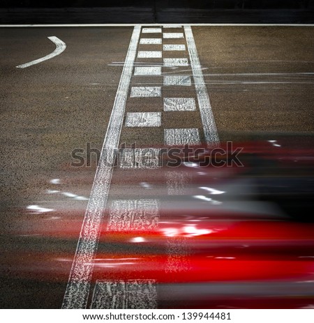 Speeding car on a kart race Royalty-Free Stock Photo #139944481