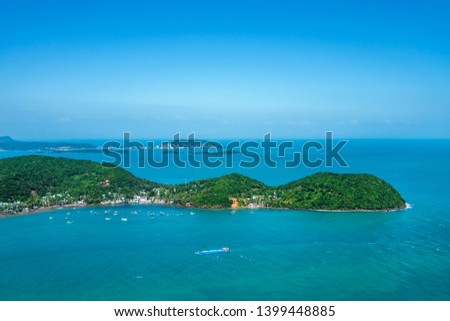 Aerial view of white sand beach and boat on the blue lagoon aqua sea. Royalty high quality free stock image of Gam Ghi island in Phu Quoc, Kien Giang, Vietnam
