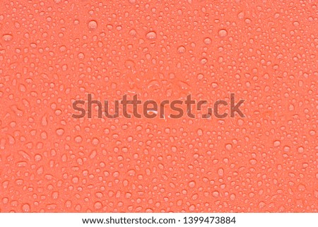 Close up of water drops on yellow tone background. Abstract orange wet texture with bubbles on plastic PVC surface or grunge. Realistic pure water droplets condensed. Detail of canvas leather texture