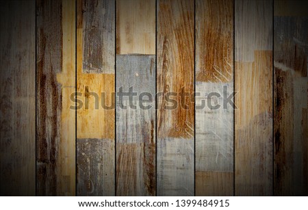 Dark wooden boards, planks. Naturally aged wood. The top view. Close-up. Seamless. vignetting