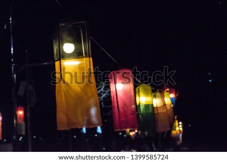 Paper lamps in the park at night