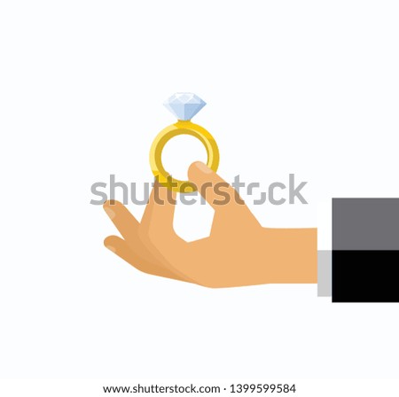 Man holding engagement golden ring in his hand, making proposal