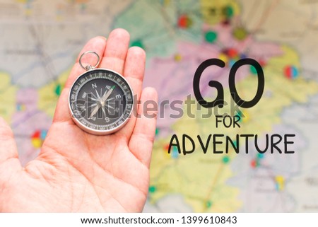 compass in hand. concept of travel