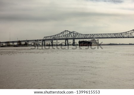 Long bridge over Mississippi river on overcast day