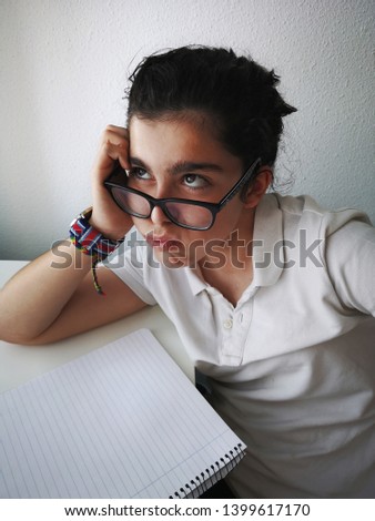 teenager tired and bored of studying