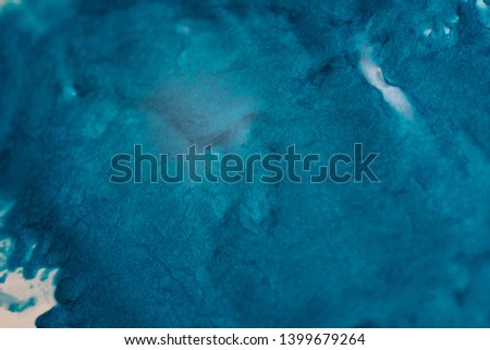 Abstract art texture background. Spilled pearl polish design. Beautiful blue paint with sparkling effect.