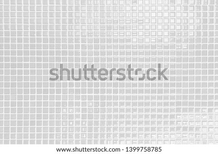 White or gray ceramic wall and floor tiles abstract background. Design geometric mosaic texture for the decoration of the bedroom. Simple seamless pattern for backdrop advertising banner poster or web